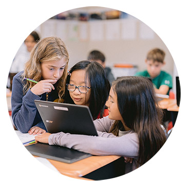 students working on computer